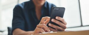 Close up of person's hands holding a smartphone